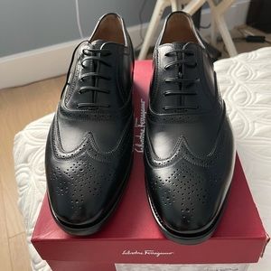 Ferragamo Black calf skin Oxfords.
